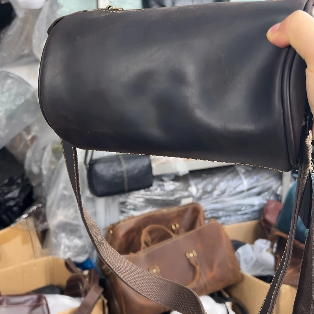 咖色疯马皮圆筒包