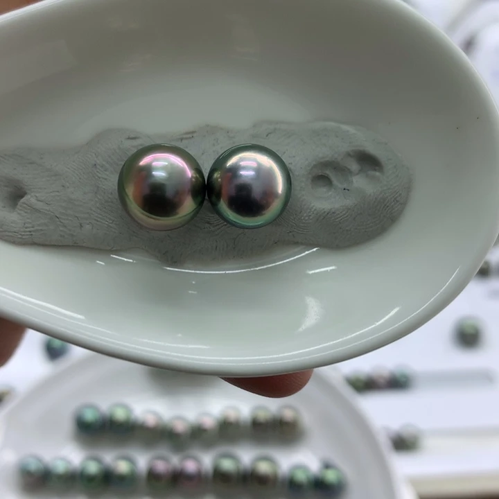 海水珍珠裸珠9.8孔雀粉炫 安安