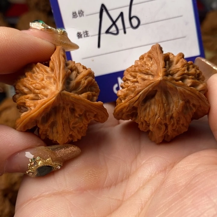 阿***凯把件桃核全品三棱