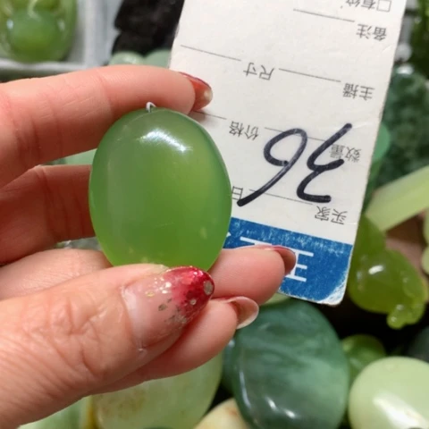 蛇纹石玉手把件未镶嵌盛**年