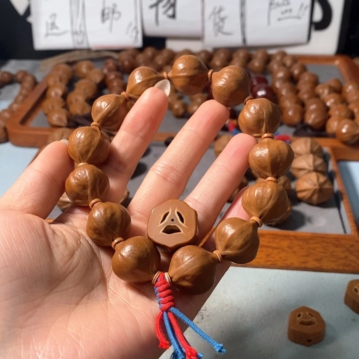 垚***光手串橄榄核0281精品蒜头铁核12+1颗