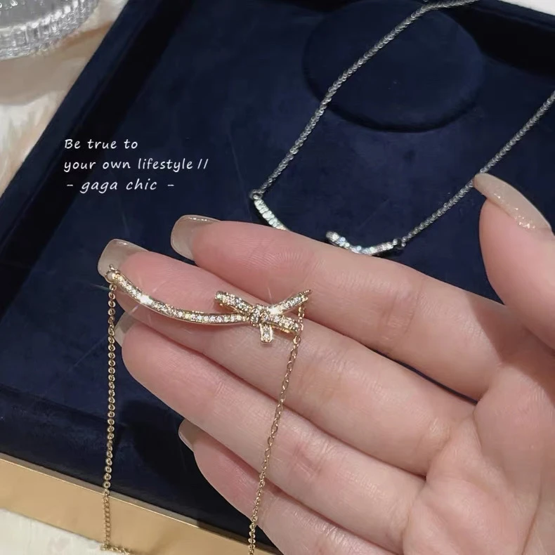 钛钢项链 微笑蝴蝶结项链319