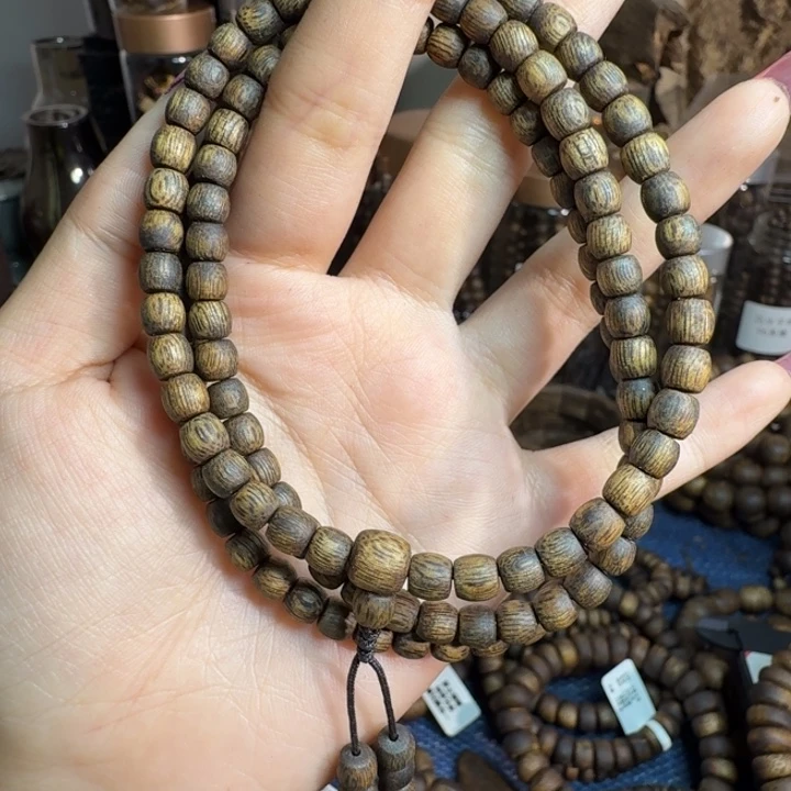 梁***_沉香碎屑沉香05鼓珠海南老料多圈