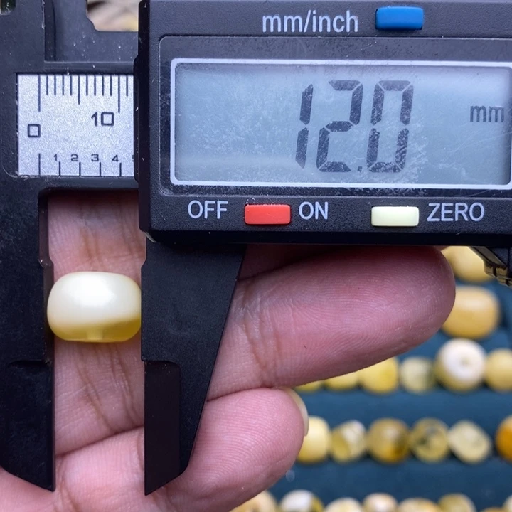 琥珀未镶嵌裸石52号12*8.6喇叭口皮色