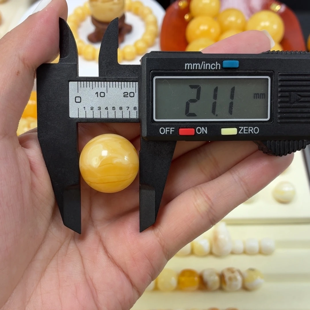 琥珀未镶嵌珠宝奇石焦皮奶橘溶洞圆珠21mm