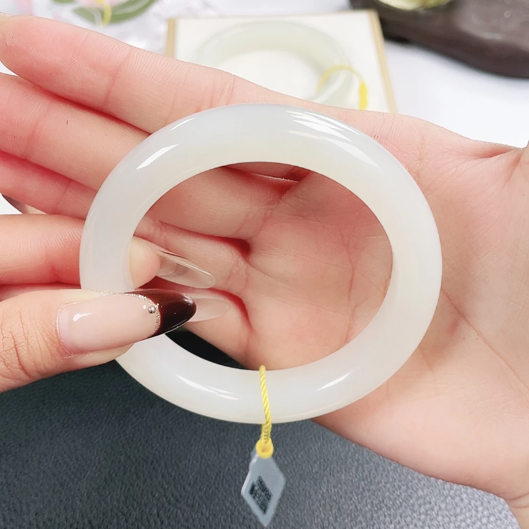 橙***和田玉未镶嵌手镯