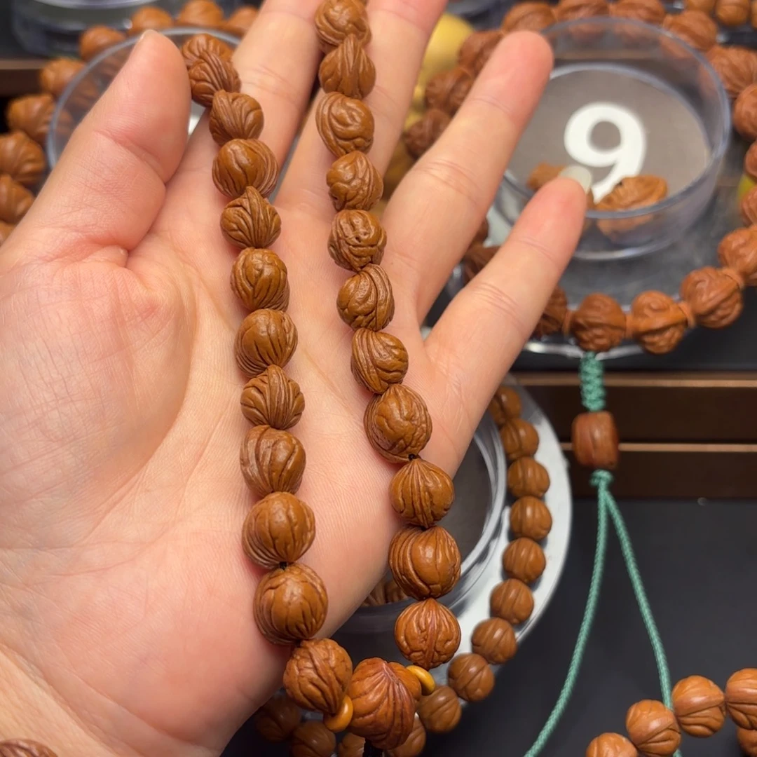 于***龙桃核吊坠野生玉龙脊11无修手捻