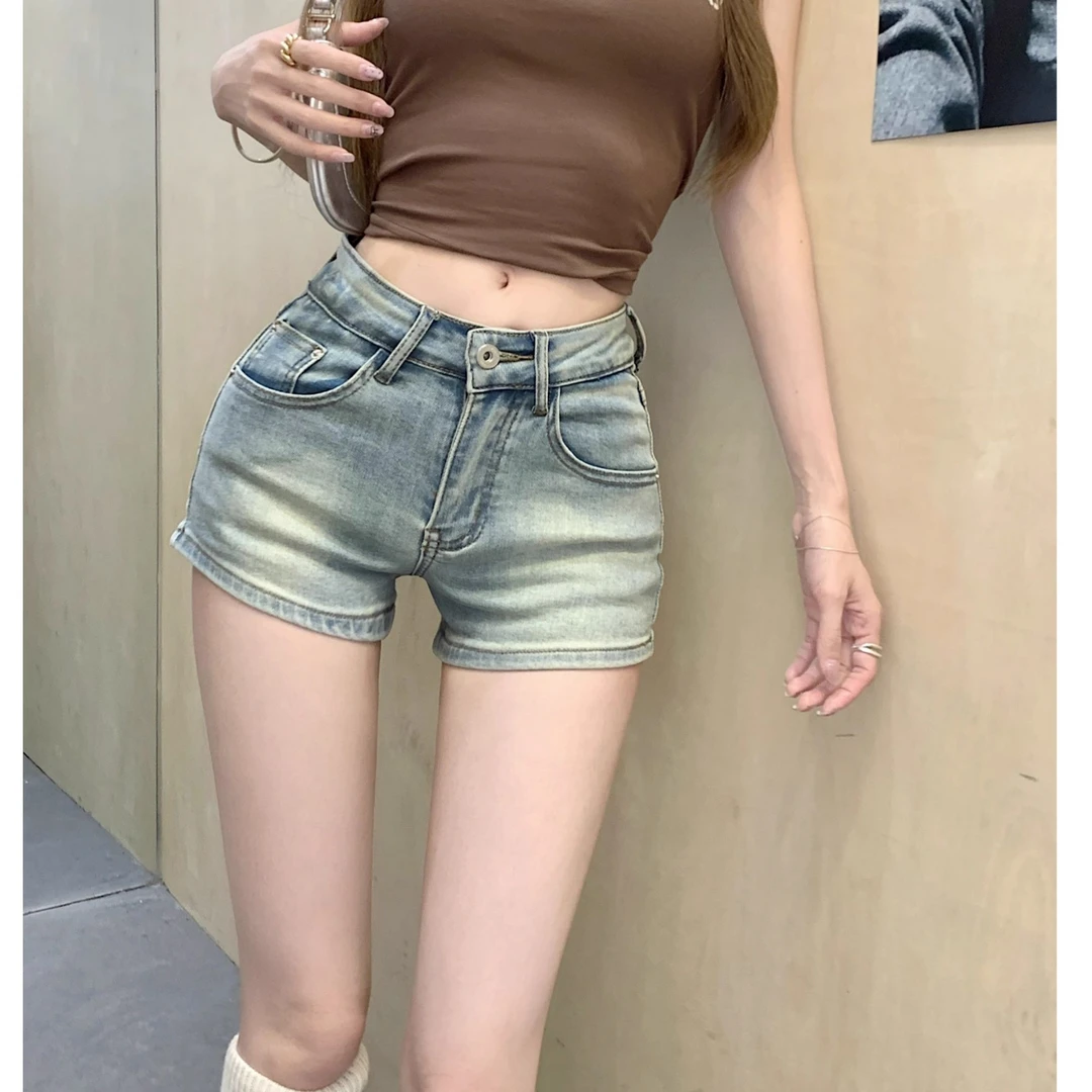 辣妹做旧水洗蓝色牛仔超短裤女夏季新款小众低腰紧身直筒提臀热裤
