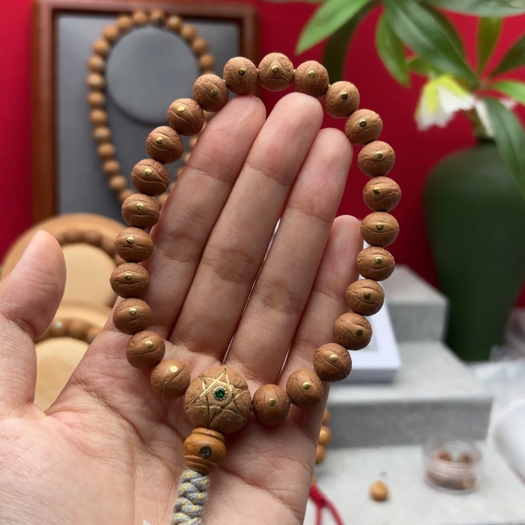 凤眼菩提手串?**?10.7左右铜钉镶嵌手串