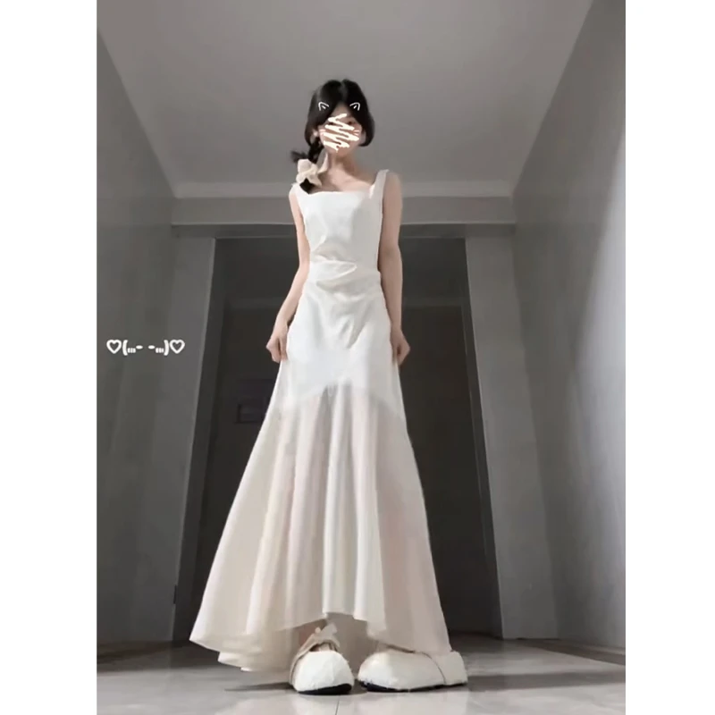 吊带连衣裙女2025夏季新款法式气质设计感收腰显瘦中长款无袖裙子