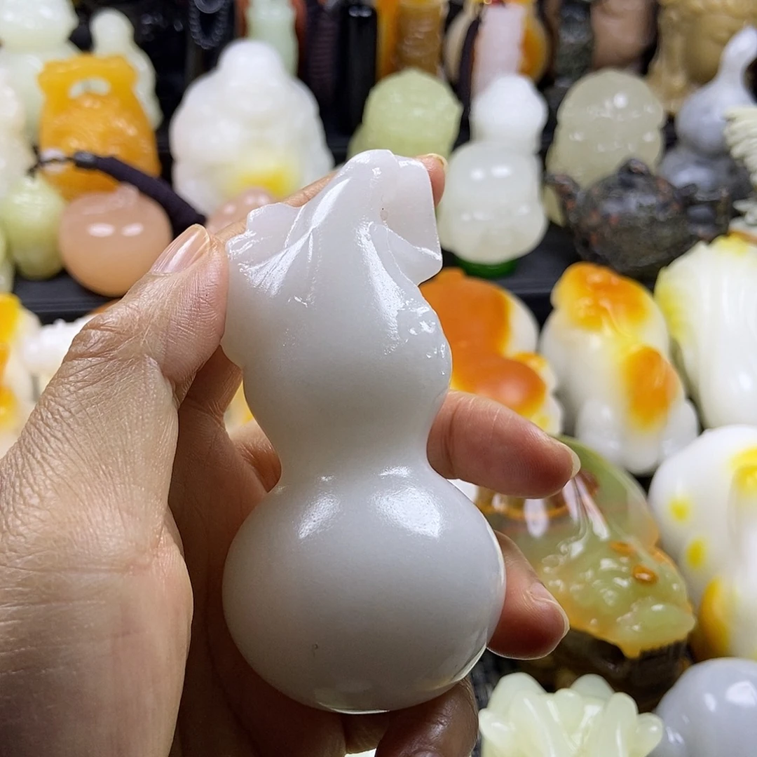 无花朵原石手把件
