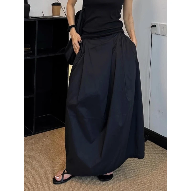 小众设计感不规则黑色半身裙2025春秋新款洋气百搭宽松a字花苞裙