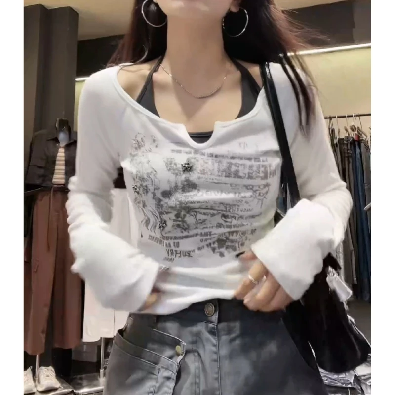 【绑带叠穿】秋款显瘦辣妹短款时尚印花长袖上衣LK2506111