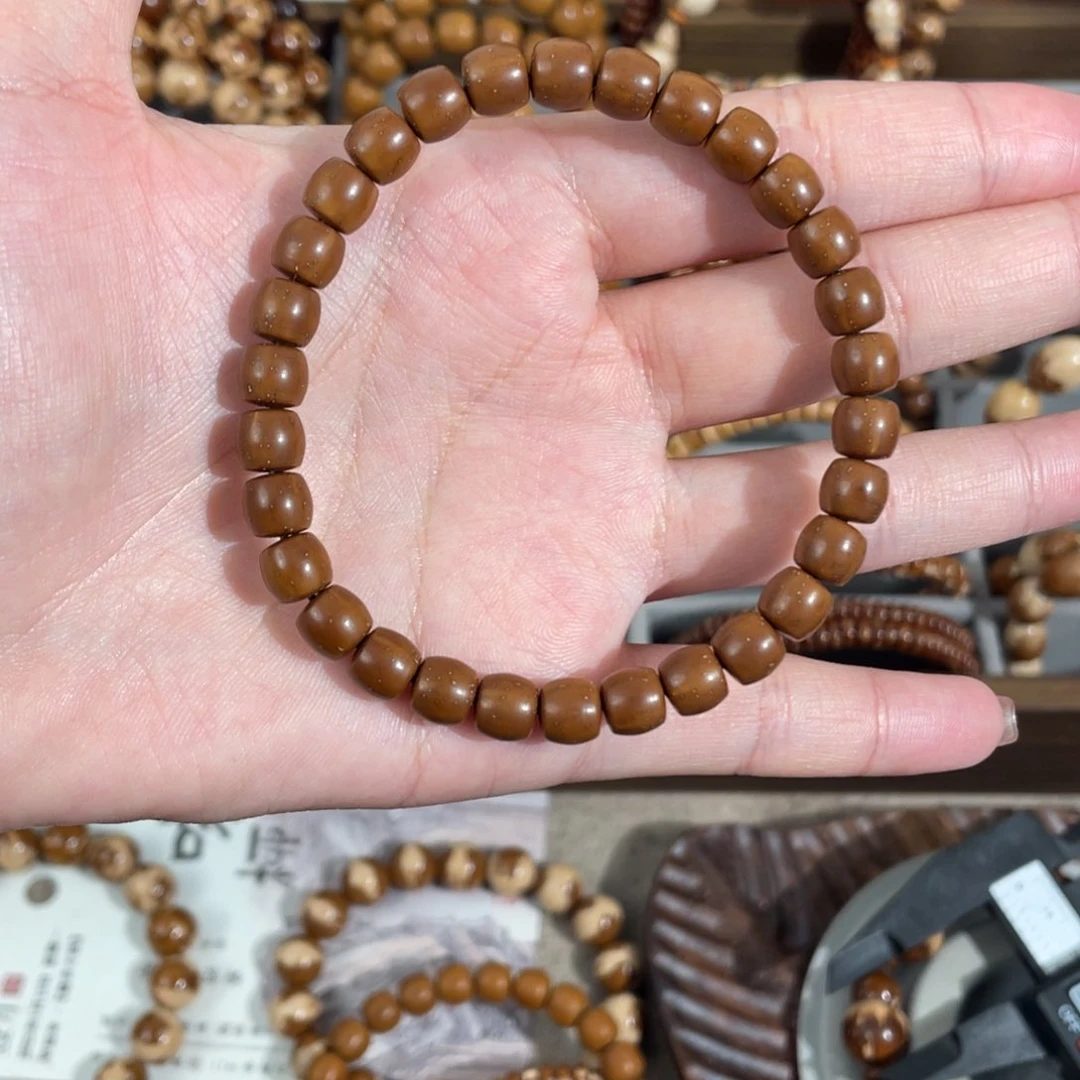 紫金鼠手串7.2*7实心直切极限弧咖皮