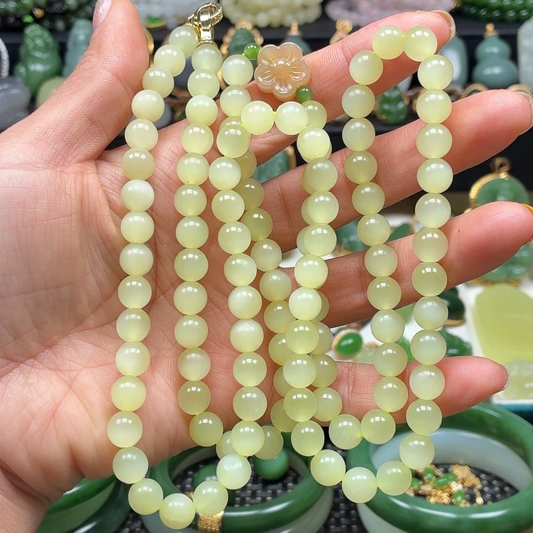 和田玉未镶嵌颈饰猫眼大漏