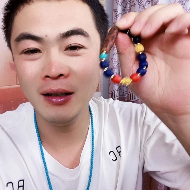 非洲檀香无事牌八眼玛瑙手链