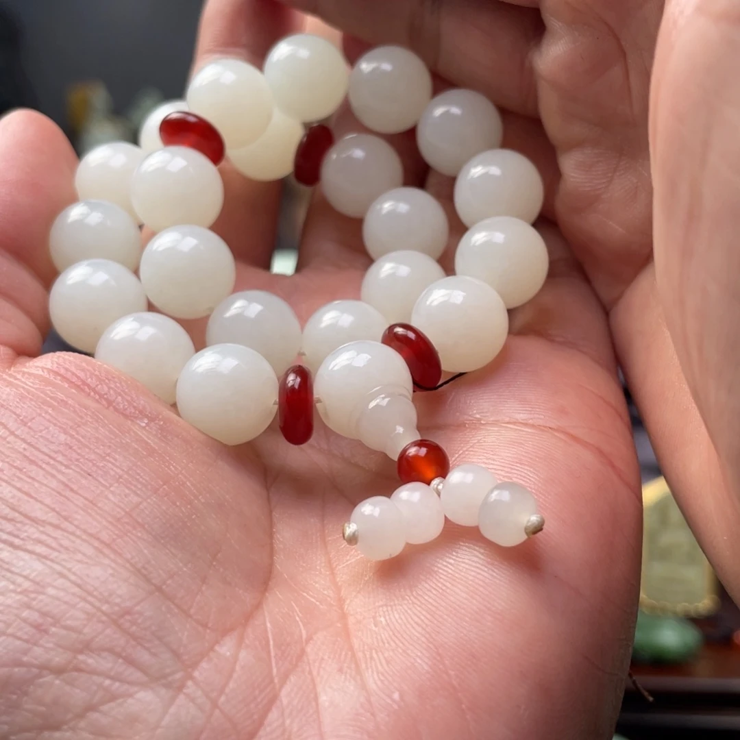 未镶嵌和田玉挂件用****了和田玉手串未镶嵌