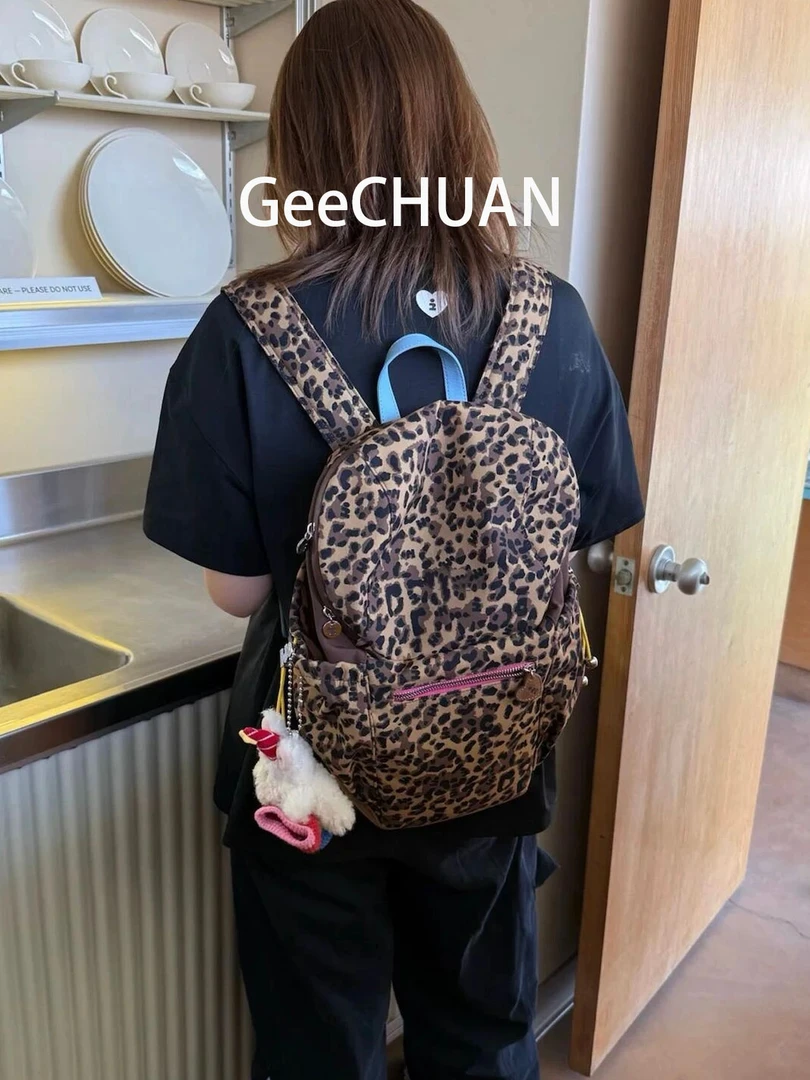 GeeCHUAN小众豹纹双肩包简约通勤大容量学生上课早八登山旅行书包