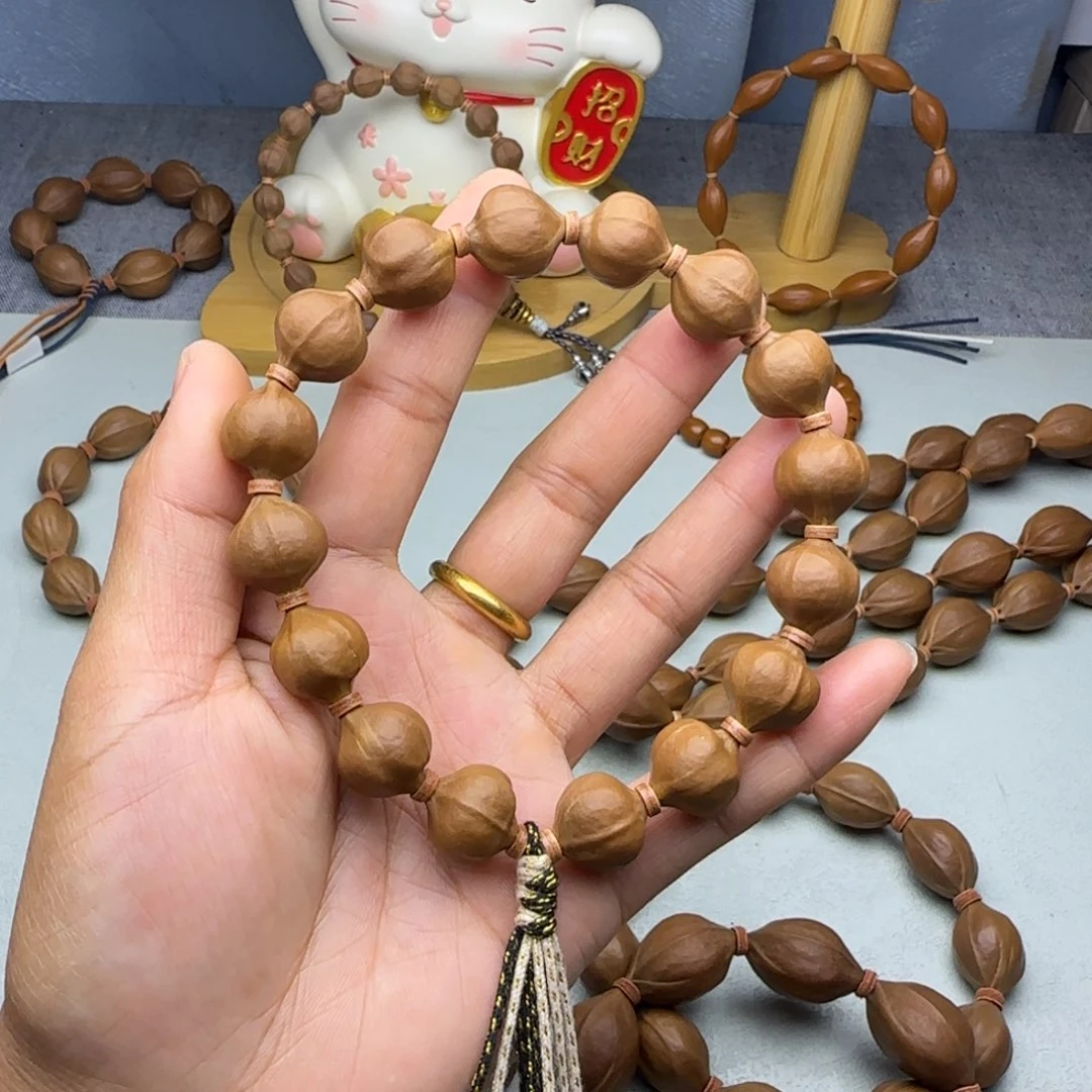 逗***”手串/手链橄榄核1.4蜜桃臀