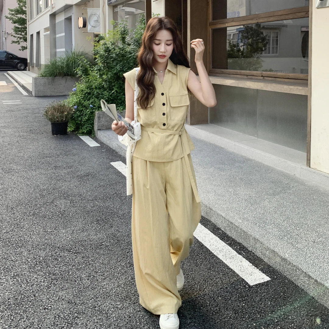 黄色又酷又飒套装女夏2025新款韩版收腰V领上衣阔腿拖地裤两件套