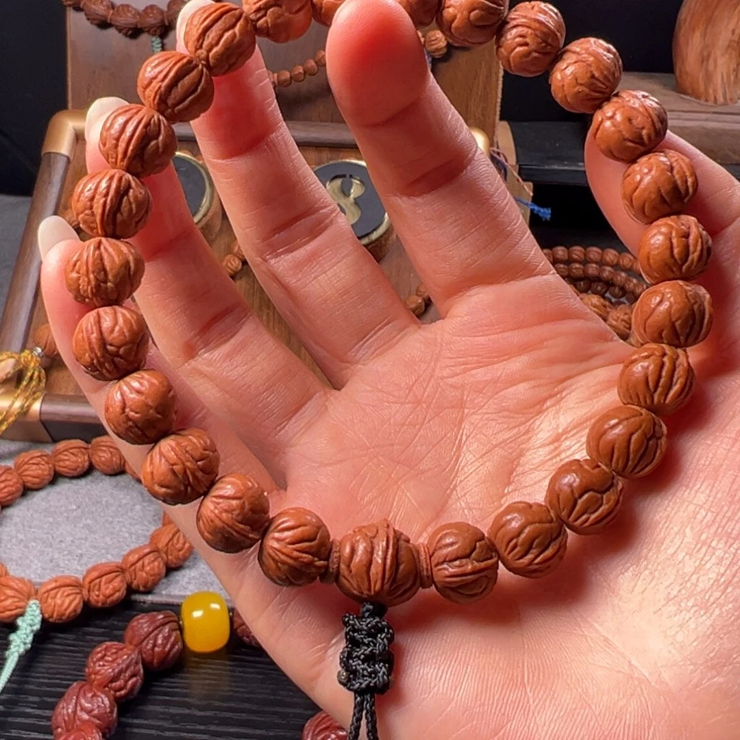 桃核吊坠12野生玉麒麟