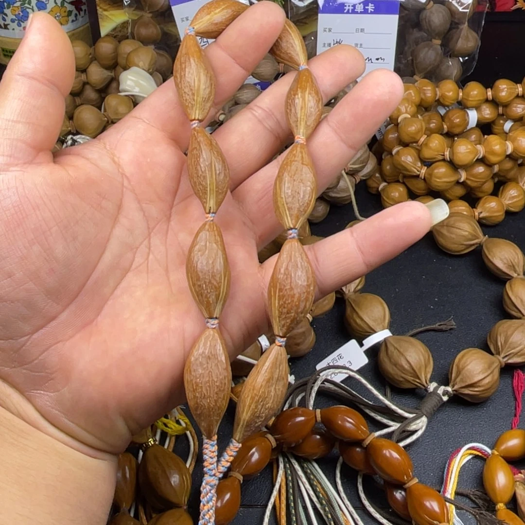 橄榄核手串高抛红皮老料手持