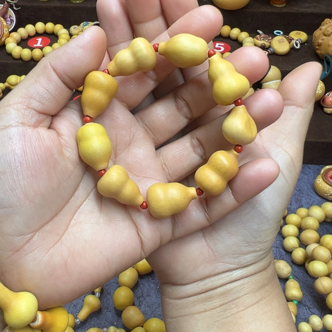 晚***。草里金手串9颗多宝