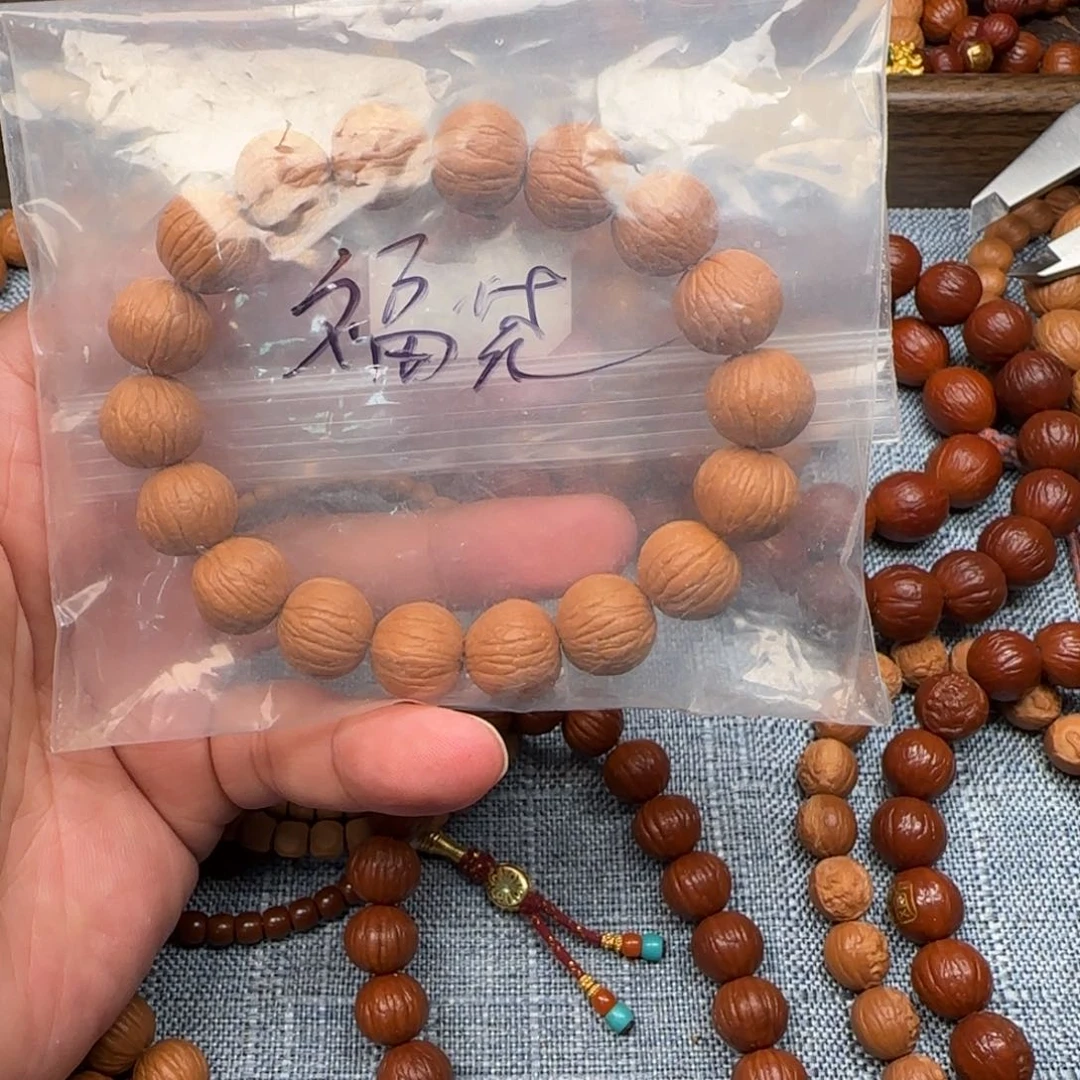 猴头核桃手串北****司14凤羽手串