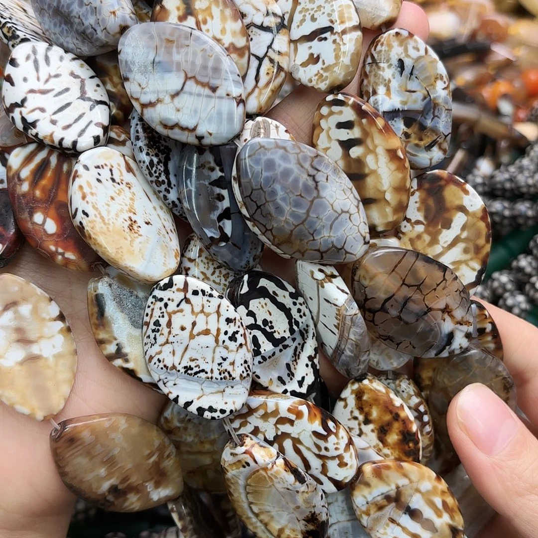 玛瑙/玉髓未镶嵌珠宝半成品24×35豹纹玛瑙蛋型一条