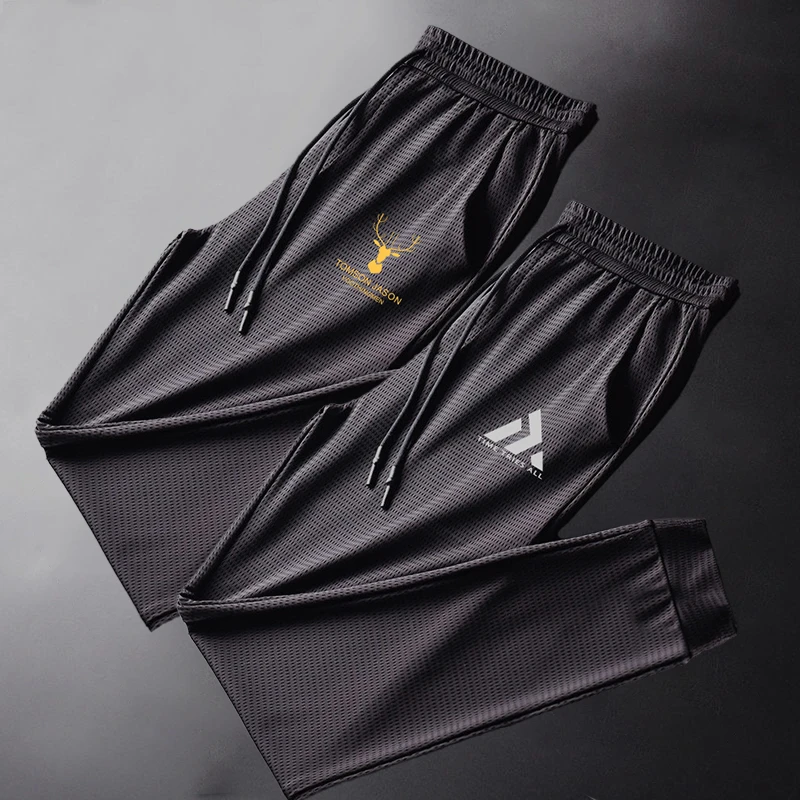 夏季薄款印花冰丝裤子男士休闲裤透气宽松大码超薄速干运动裤