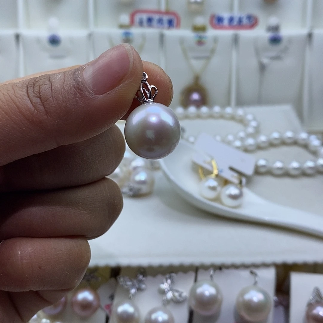 曼***贸银S925镶嵌淡水珍珠吊坠(赠链)