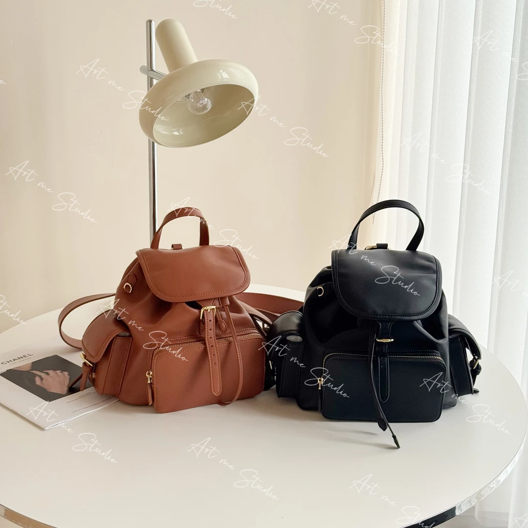 缪系高品质超软牛皮轻松驾驭任何搭配旅行两色双肩背包24bb022