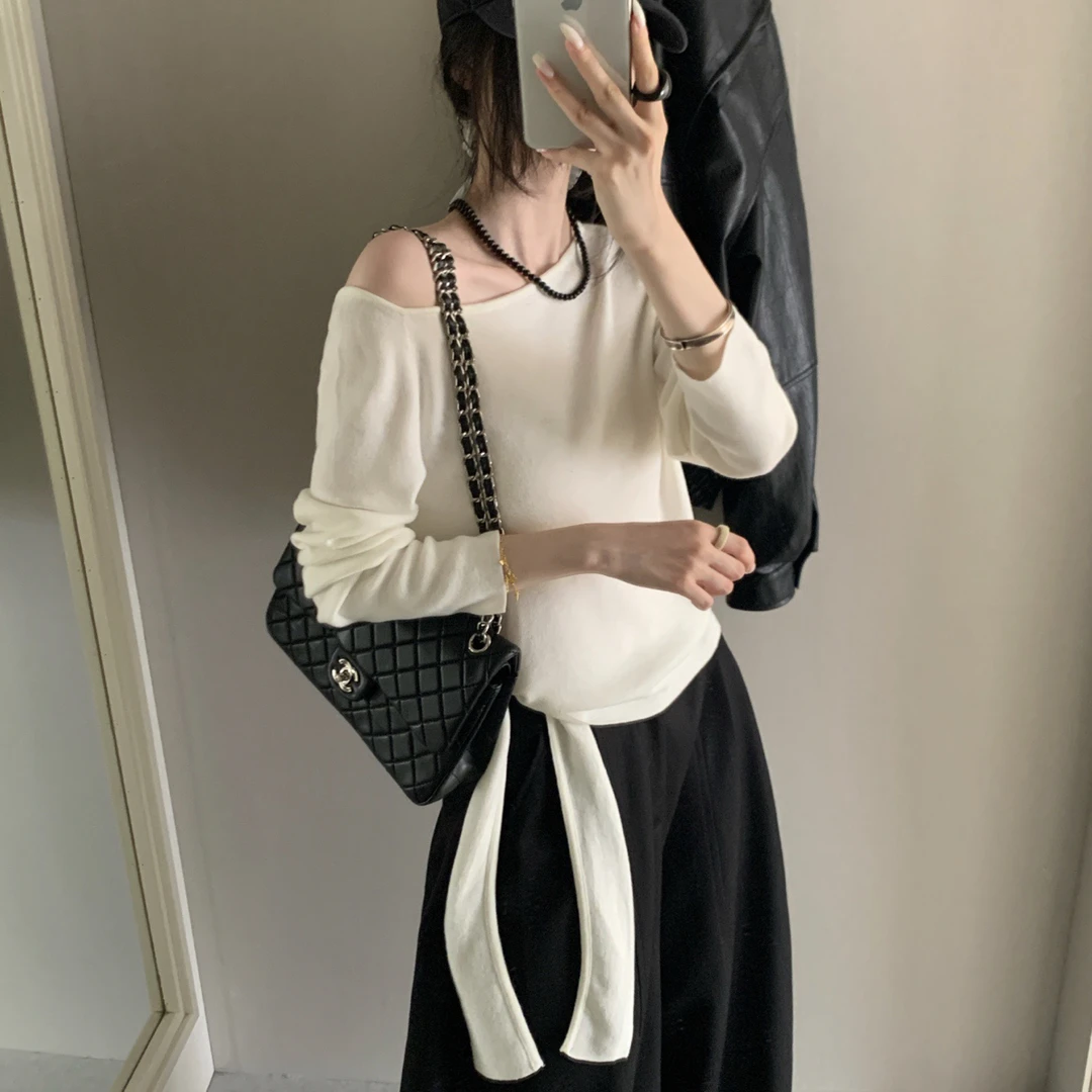 【OZZ—71862】韩版条纹T恤拼接修身时尚性感风碎花长袖绑带设计感