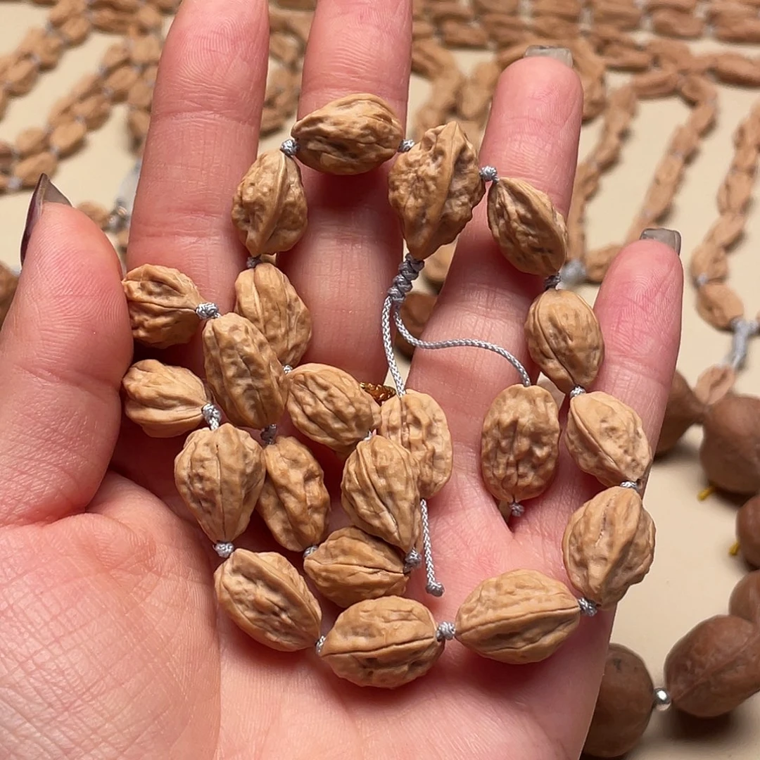 叫***、桃核手串异形手持