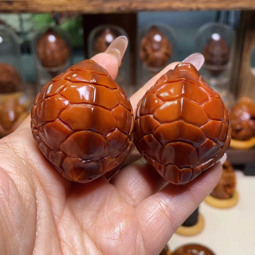 橄榄核吊坠伊*夕玉华富甲一对四零尺