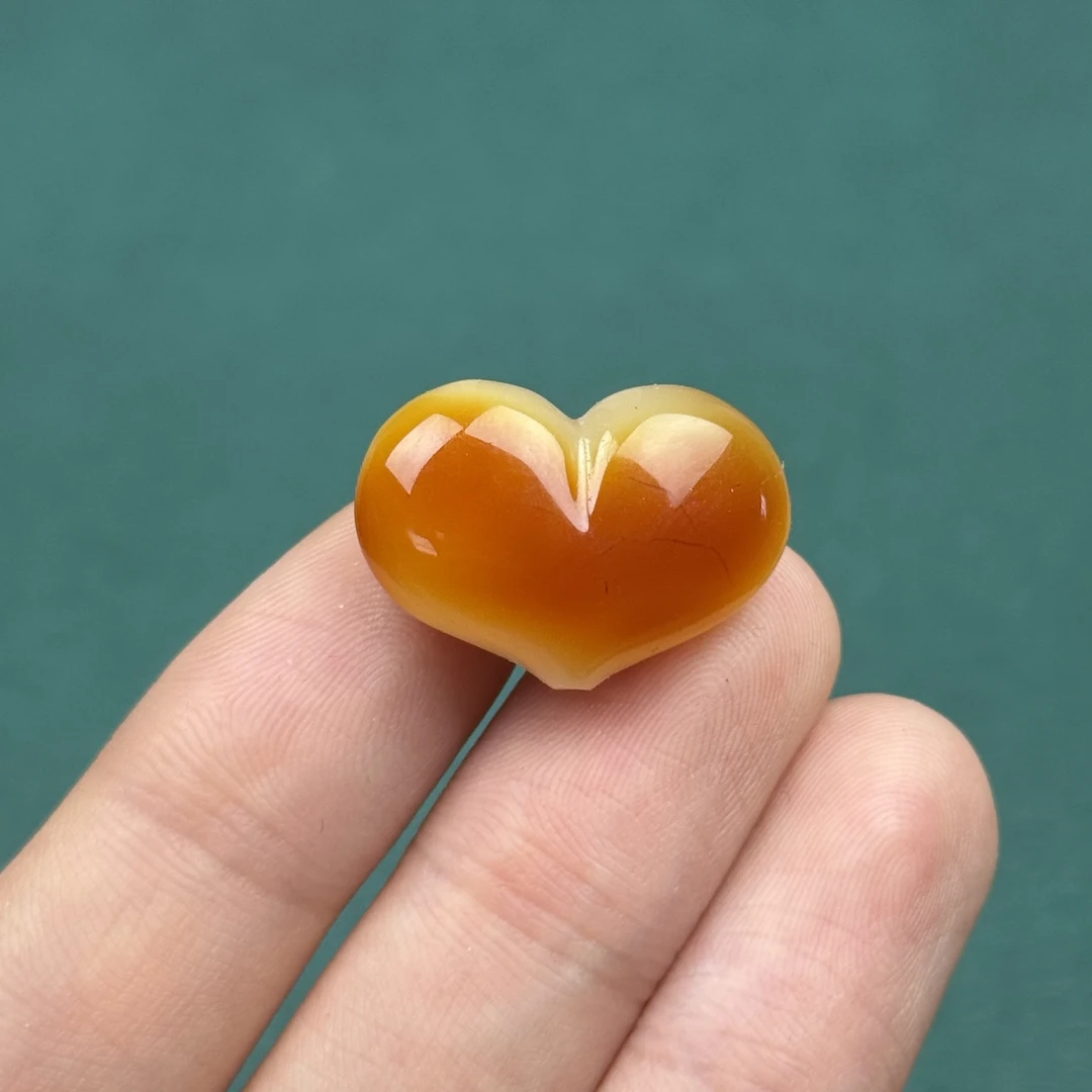 K9985天然原矿蜜蜡 屁桃爱心23*16*8mm 支持鉴定 假一罚十