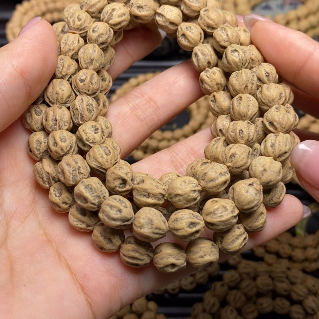 柏香籽/百香籽吊坠左**分