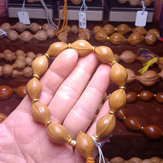 以***为手串/手链橄榄核橄榄核手串1.4三花铁核