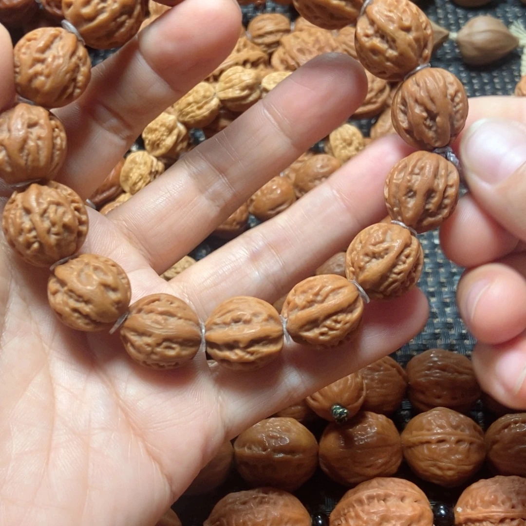 孟***源吊坠文玩核桃京八棱手串