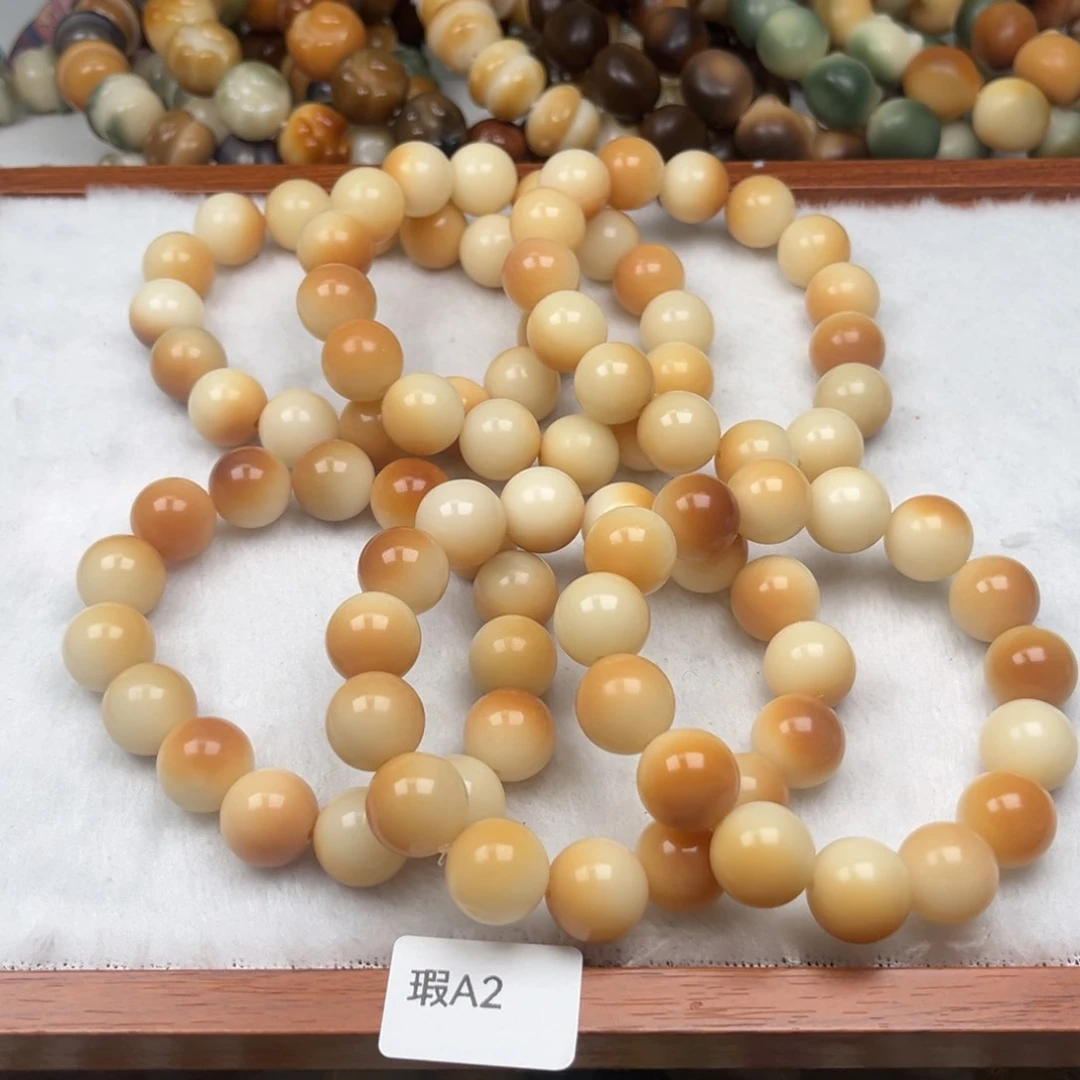 菩提根/象牙果吊坠瑕a2圆珠随机一串15mm