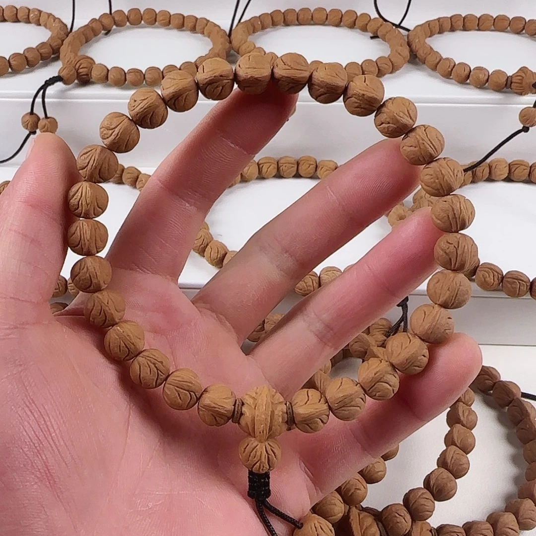 桃核吊坠大圈口手持玉龙