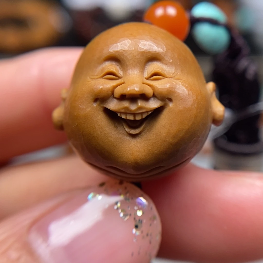 橄榄核吊坠笑佛单子