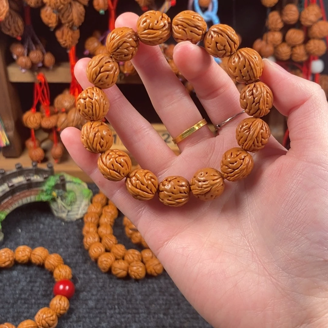 吊坠桃核桃枭手串