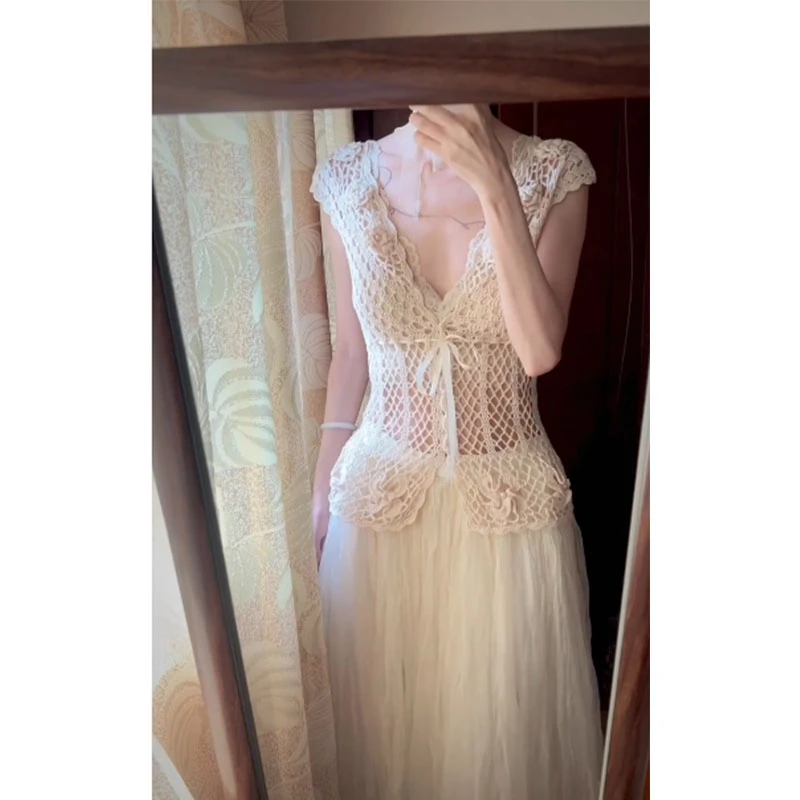 纯欲气质辣妹设计感修身镂空V领针织背心上衣高腰休闲小众半身裙