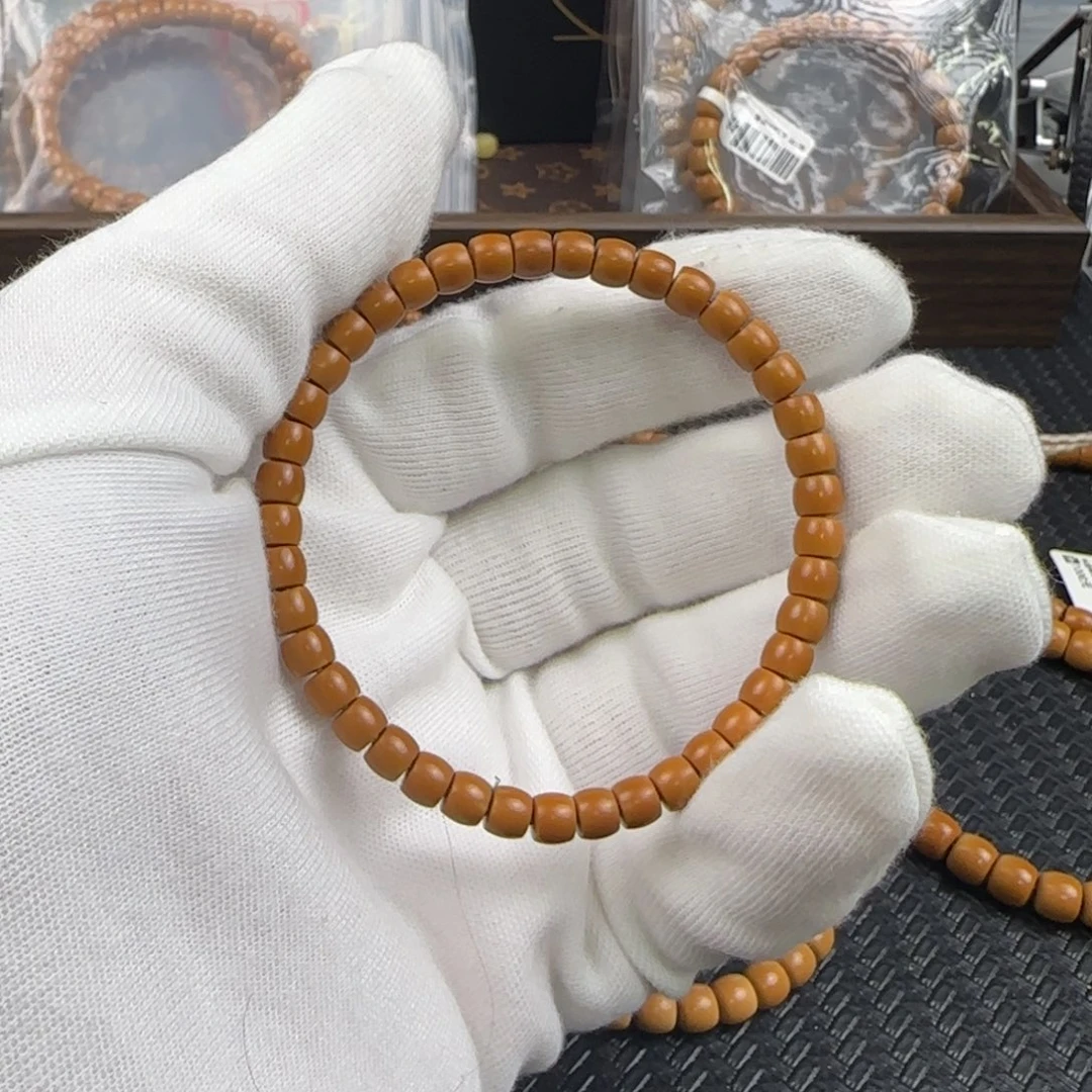 橄榄核吊坠帅**爸5.8mm老挝核尖直切单圈