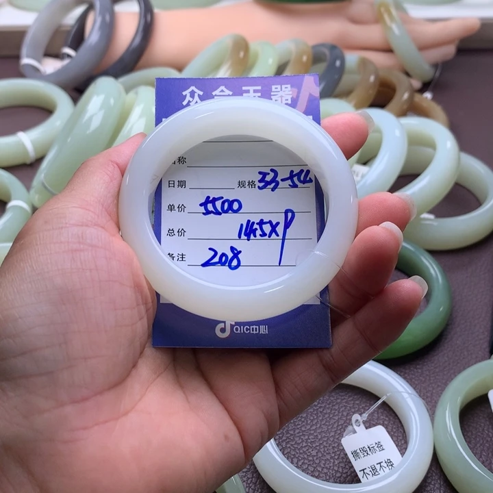 七***)和田玉未镶嵌手镯