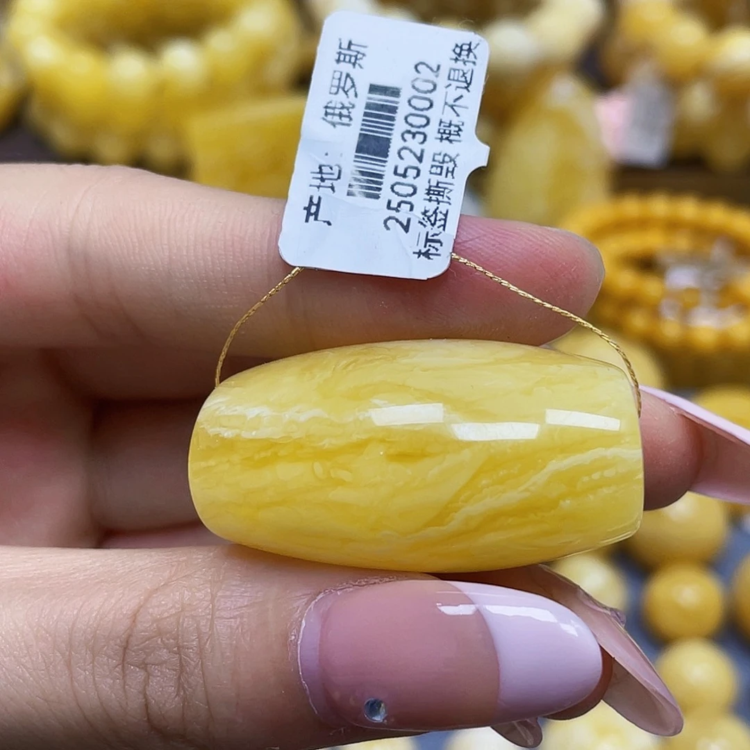 蜜蜡未镶嵌裸石37.4*19.8mm.瑕