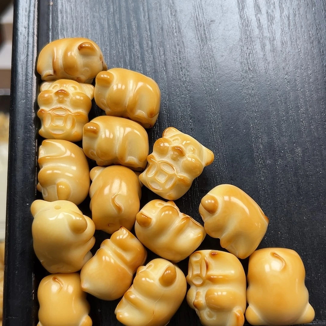 手串菩提根/象牙果瑕疵炭烤抱钱猪有裂15颗