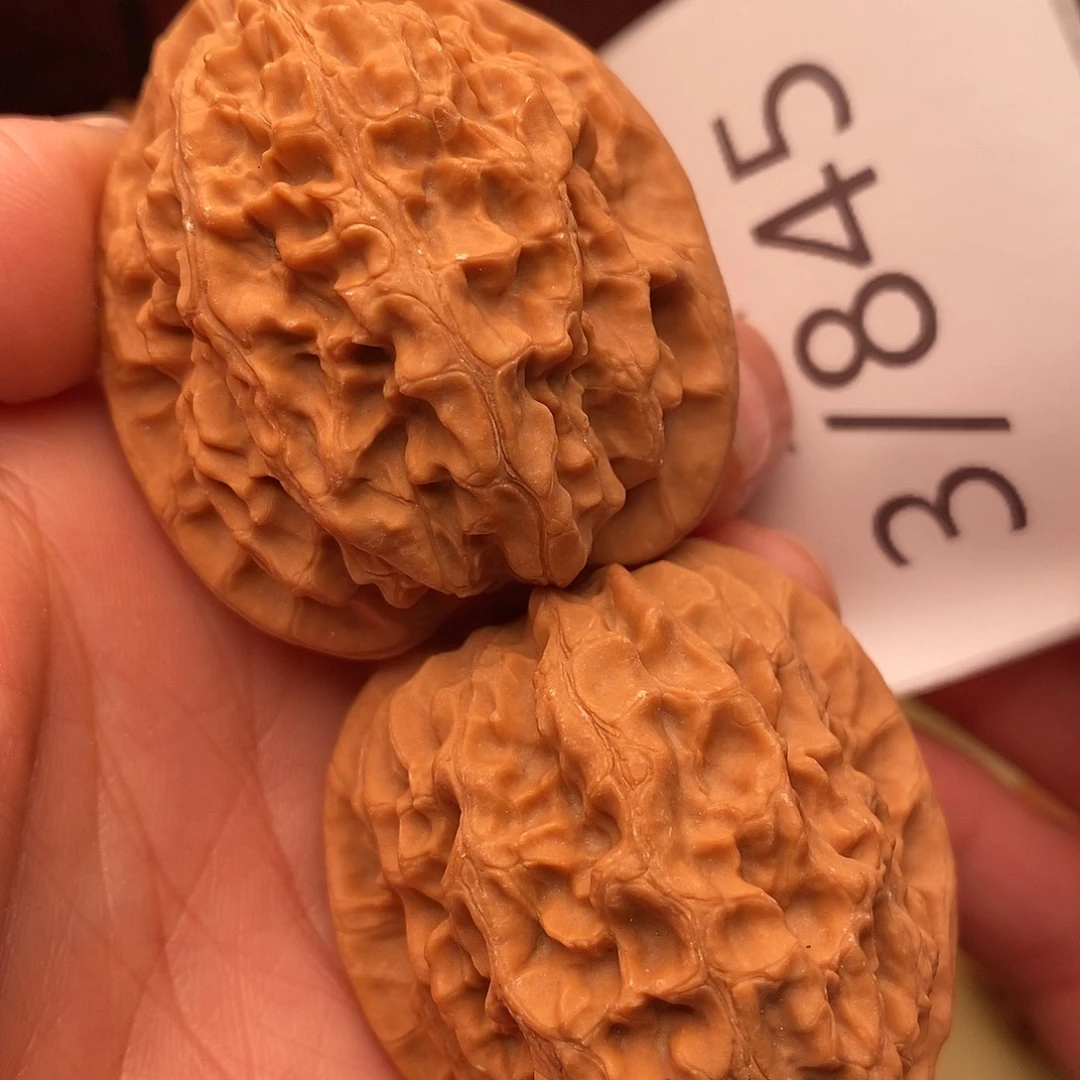 文玩核桃把件40金牛