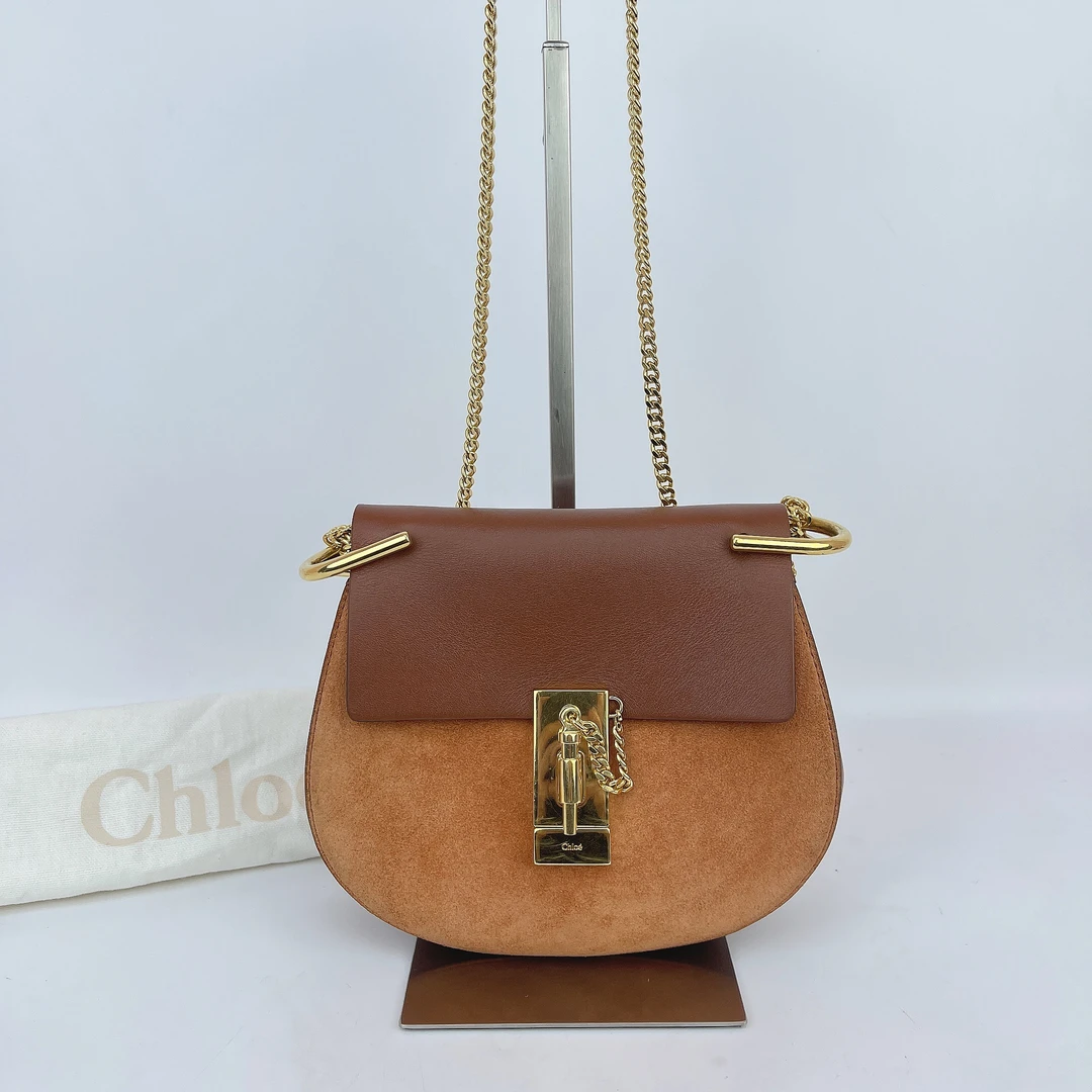 95新 Chloe/蔻依 蔻依 棕色小猪斜挎包底长19 D256
